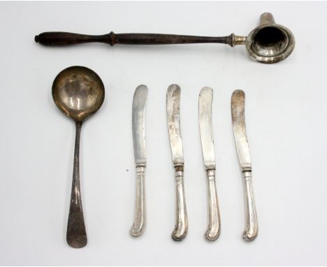 A silver sauce ladle, 2.5oz, together with a silver candle snuffer with turned wood handle and four butter knives with filled