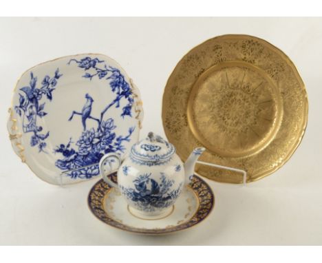 A Royal Worcester cabinet plate, covered with etched gold decoration together with a Booths blue and white Peony pattern teap