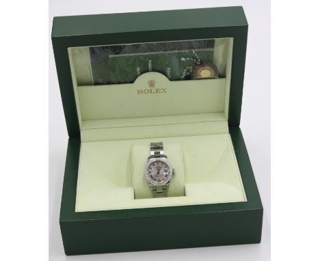 A Rolex ladies oyster perpetual datejust superlative chronometer with diamond bezel, diameter 26.75cm with box, two spare lin