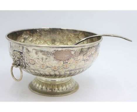 A punch bowl and ladle.