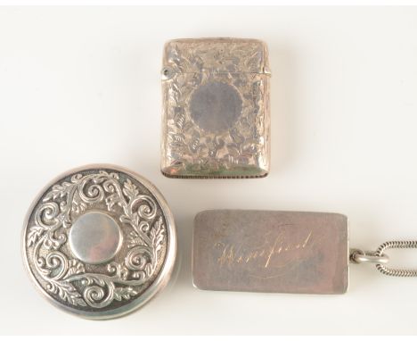 A early silver plain vesta case and a engraved silver vesta case and a silver patch box.