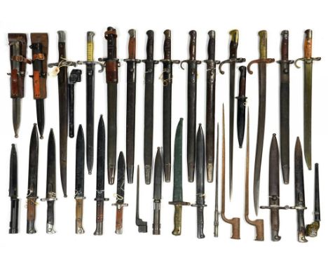 MISCELLANEOUS BRITISH AND FOREIGN BAYONETS, CIRCA WORLD WAR ONE AND LATER mostly with scabbard (approximately 30)