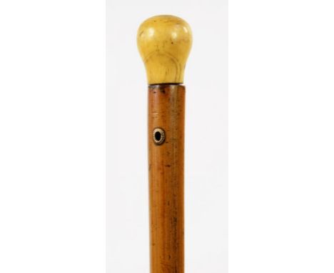 A GEORGE MALACCA CANE WITH BULBOUS TURNED IVORY POMMEL, BRASS TIP WITH IRON SHOE, 130CM L, EARLY 19TH C