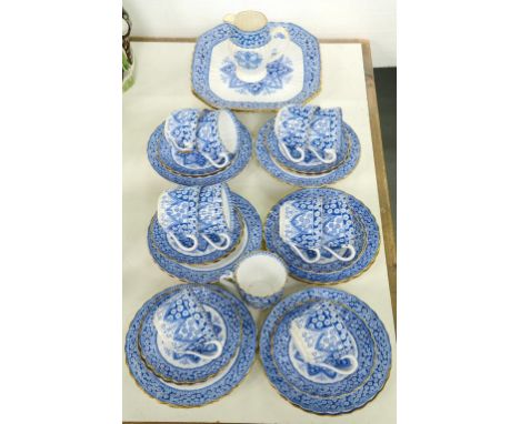 A COPELAND FLUTED BONE CHINA BLUE AND WHITE TEA SERVICE, INCLUDING A PAIR OF SHAPE SQUARE PLATES, 23CM W, IMPRESSED AND PRINT
