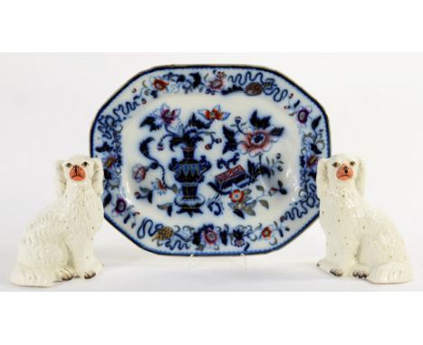 A PAIR OF STAFFORDSHIRE EARTHENWARE MODELS OF SPANIELS, 24CM H, LATE 19TH C AND A VICTORIAN STONE CHINA MEAT DISH IMPRESSED I