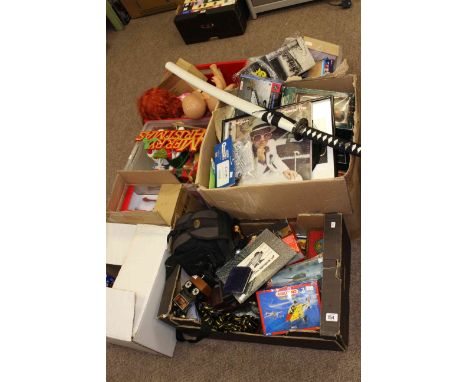 Seven boxes of assorted toys, dolls, projector and films, Christmas decorations etc.