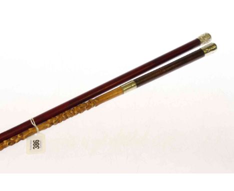 Swagger stick and a cane with white metal top