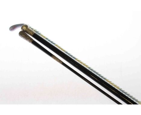 Silver-handled cane, silver-mounted swagger stick and a coloured sand-filled glass cane (3)