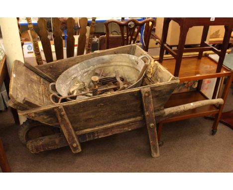 Vintage manual vertical drill, wooden wheelbarrow, tin bath and contents