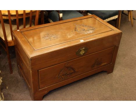 Carved Oriental camphorwood trunk