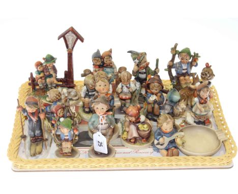 Collection of eighteen Hummel figures and groups