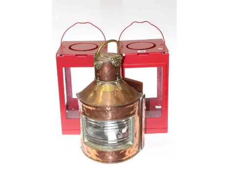 Copper ship's lantern and pair of candle lanterns