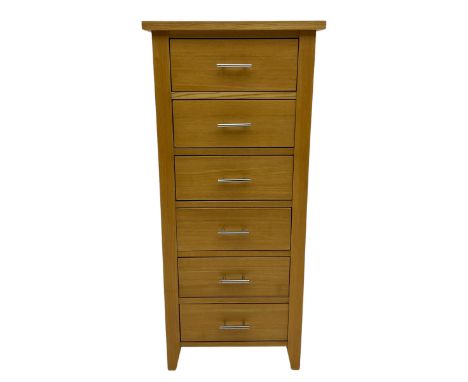 Light oak six drawer pedestal chestDimensions: Height:&nbsp;116cm&nbsp; Length/Width:&nbsp;51cm&nbsp; Depth/Diameter:&nbsp;40
