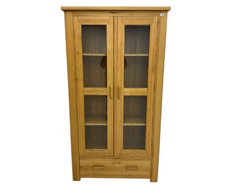 Light oak bookcase display cabinet, fitted with two glazed doors, drawer to baseDimensions: Height:&nbsp;192cm&nbsp; Length/W