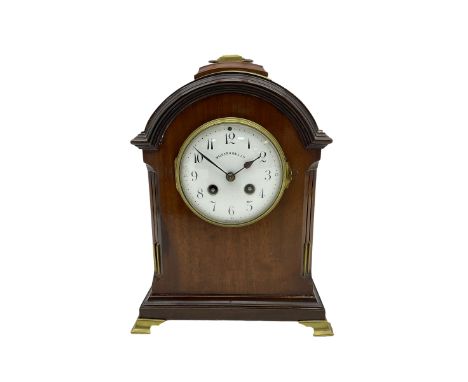 An early 20th century “Walker & Hall” 8-day mantle clock with a French striking movement striking the hours on a coiled gong,
