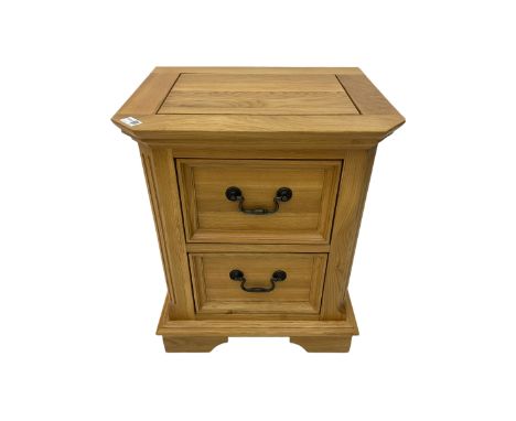 Small light oak two drawer pedestal chestDimensions: Height:&nbsp;60cm&nbsp; Length/Width:&nbsp;50cm&nbsp; Depth/Diameter:&nb