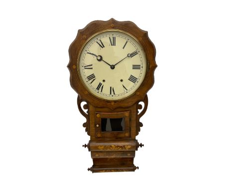 An American drop dial wall clock in a light mahogany case with inlay, scalloped wooden dial bezel and glazed pendulum door, w