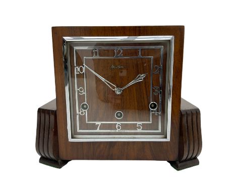 A 1930s “Bentima” Westminster chiming English art deco mantle clock in a stylised mahogany case with a square dial, chrome Ar