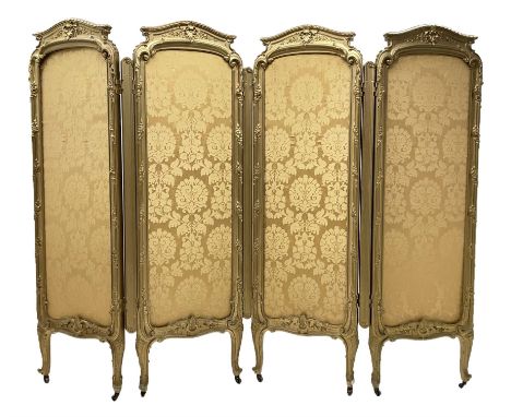 Late 19th/early 20th century French Rococo style gilt wood and gesso dressing screen, four double hinged panels, each with sh