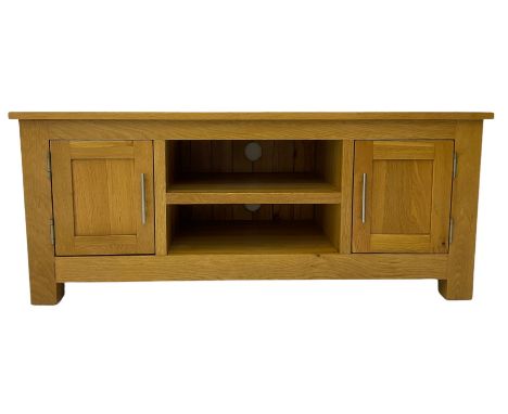 Light oak television stand, fitted with open shelves and two cupboardsDimensions: Height:&nbsp;51cm&nbsp; Length/Width:&nbsp;