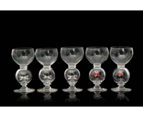 A set of five 1930s Stevens & Williams clear crystal glass goblets with a cup form bowl above a large hollow blown knop each 