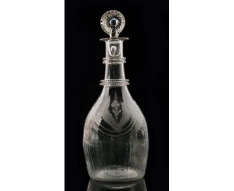 An Irish Cork decanter circa 1810, of taper form with basal moulding below foliate motifs within ribbon tied garlands and rib