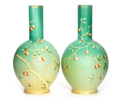 A pair of late 19th Century Harrach vases of globe and shaft form, each enamel decorated with fruiting boughs over a graduate