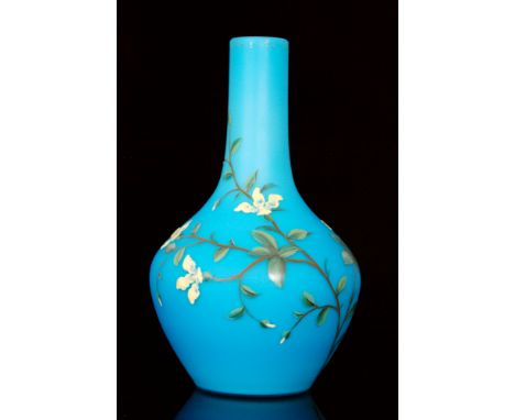 A late 19th Century continental vase in the manner of Harrach of shouldered ovoid form with tall collar neck, cased in blue o