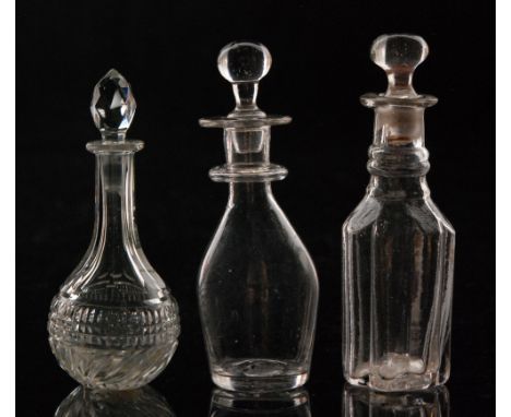 A late 18th Century miniature decanter circa 1800, of Prussian form with a single bladed ring below wide flat rim and solid b