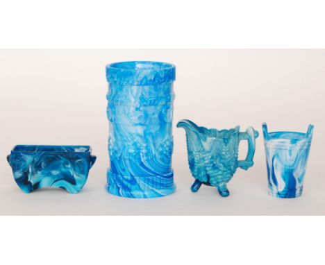 Four pieces of 19th Century blue marbled pressed glass comprising a cylindrical vase with moulded bands of decoration, a twin