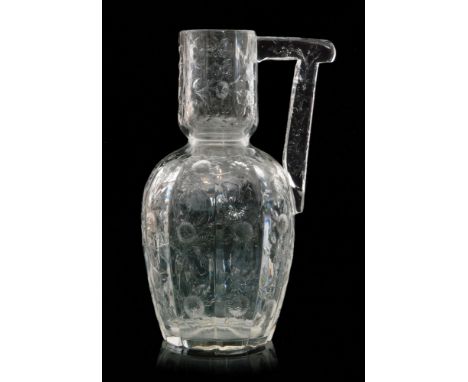 A late 19th Century Stevens & Williams rock crystal glass water jug, shape 6464, pattern 5740, in the Aesthetic taste of moul