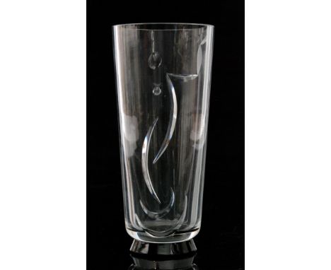 A 1930s Orrefors crystal glass vase by Vicke Lindstrand the onyx foot below the tapered cylindrical body with a cut abstract 