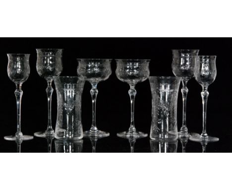 A collection of early 20th Century Stuart & Sons table glasses, polished intaglio cut with floral swags and garlands below a 