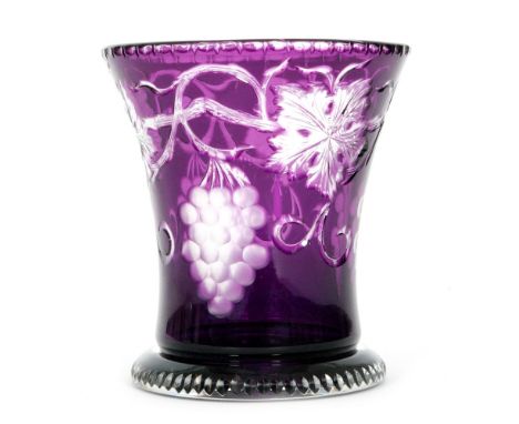 A 1930s Stevens & Williams footed flared vase in amethyst over clear crystal intaglio cut with floral trailing above engraved