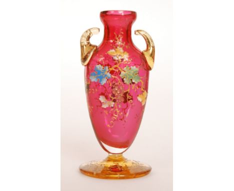 A late 19th Century Moser vase of compressed ovoid form with collar neck and applied scroll handles, relief, enamel and gilt 