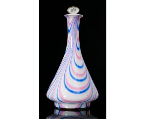 A 19th Century Nailsea style decanter of tapered conical form with tall collar neck and flat rim, decorated with a pink and b