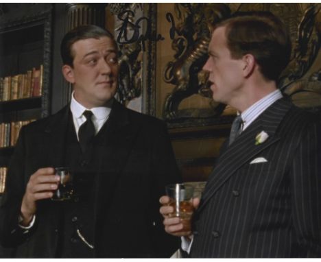 Stephen Fry signed Jeeves and Wooster 10x8 colour photo. Stephen John Fry (born 24 August 1957) is an English actor, broadcas