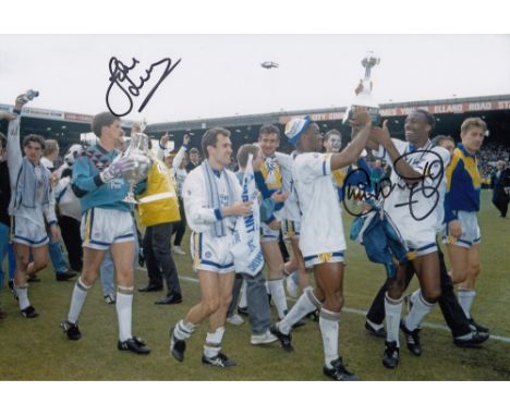 Autographed Leeds United 12 X 8 Photo - Col, Depicting Players Parading The First Division Trophy Around Elland Road Followin