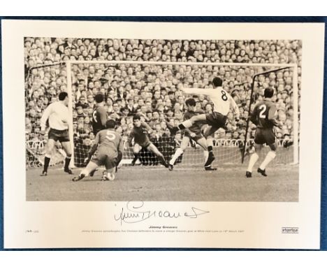 Jimmy Greaves signed 23x17 black and white print pictured in action for Tottenham Hotspur against Chelsea at White Hart Lane 