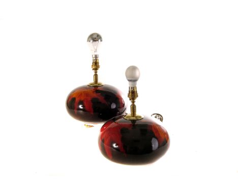 A pair of Poole pottery Forest Flame pebble lamp bases, having red and orange leaf decoration, marked to base, untested 