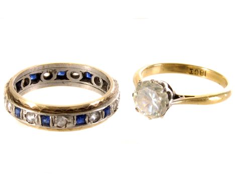 A 9ct gold diamond and sapphire eternity ring, size N, together with an 18ct gold paste set solitaire, size K, approx. 5.8g (