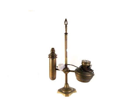 A brass table lamp,  with adjustable fittings, 57cm high 