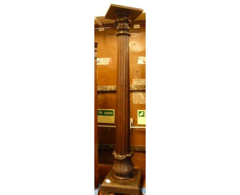 A metal carriage trunk, together with a William IV mahogany torchere with reeded column, and lappet carved base (2) 
