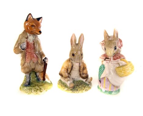 A group of nine Beswick and Royal Albert Beatrix Potter ceramic figures, including Mr Todd, Mrs Rabbit, Benjamin Bunny sat on