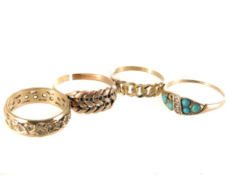 A 9ct gold and gem set eternity ring, together with three other rings, one with hardstone design, AF and two others (4) 