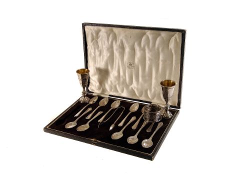 A collection of silver and silver plated items, including a set of continental goblets, various flatware, cased set of coffee