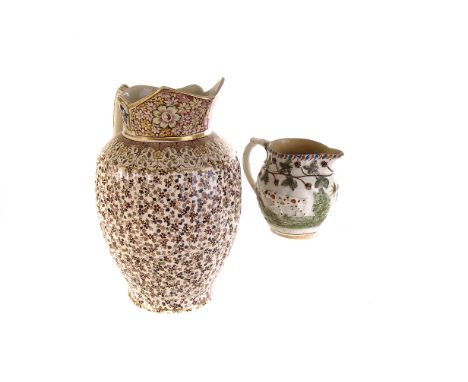An 18th century pearlware water jug, having relief design of dogs amongst foliage, together with a large Brooklyn ceramic wat