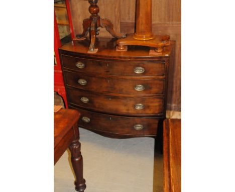 A Georgian mahogany bow fronted chest,  of four graduated drawers, over splayed bracket feet 92cm W 