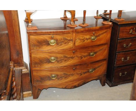 A Georgian mahogany bow fronted chest,  of two over three drawers, with prince of Wales feather handles, on splay bracket fee