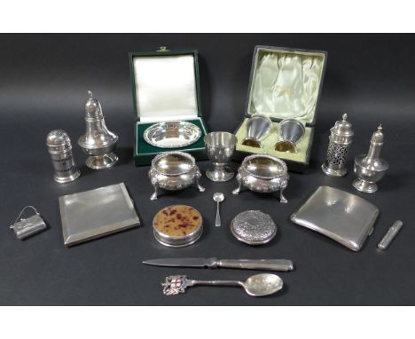 A collection of silver items, including a pair of Victorian cauldron salts, raised on three hoof feet, London, 1878, by Willi
